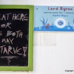 Sign by a taverna, Ios