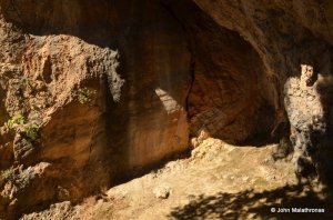 A carved recess at the rock face